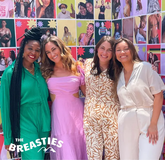 Breasties a group of women standing next to each other