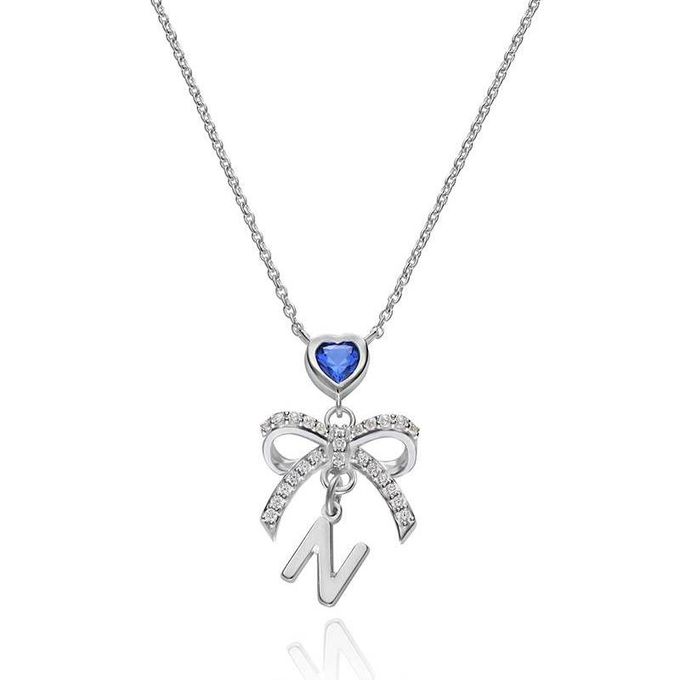 Letter N Tied To You Initial Necklace in Sterling Silver with a blue heart and a bow