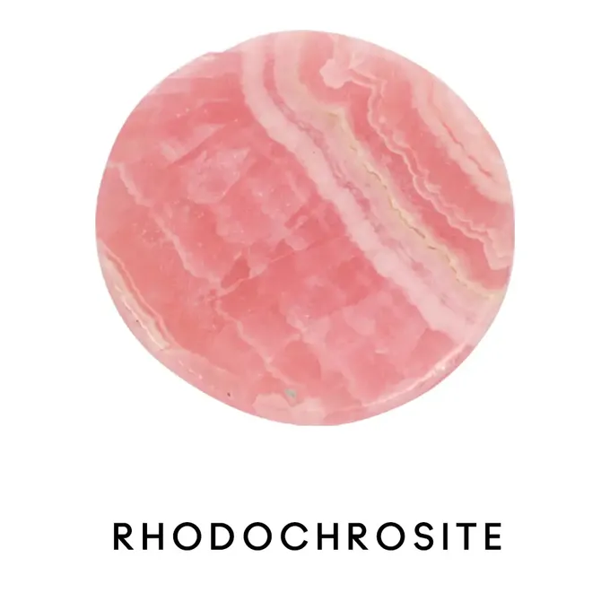 a pink marble with the words rhodochroste in black lettering