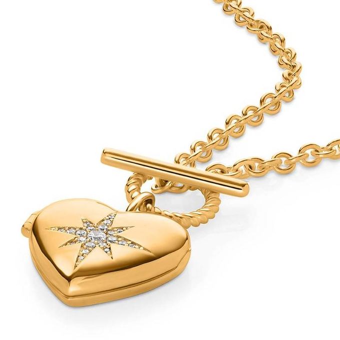 Stella Puffy Heart Photo Locket Necklace in Gold Finish a heart shaped locke with a star on it