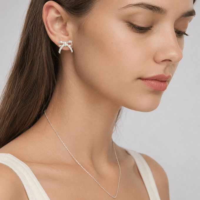 Silver Bow Earrings on Graduate