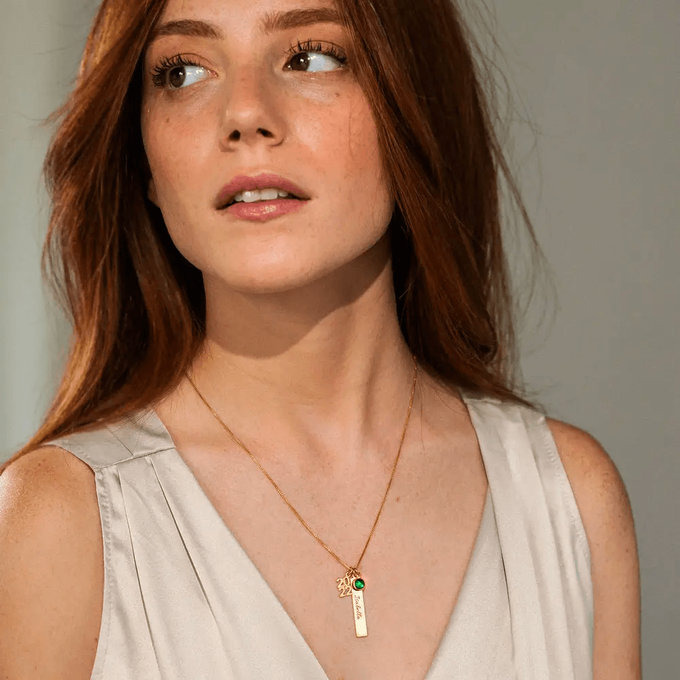 Graduation necklace on a graduate