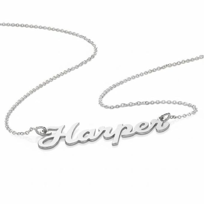 a name necklace with the word harper on it