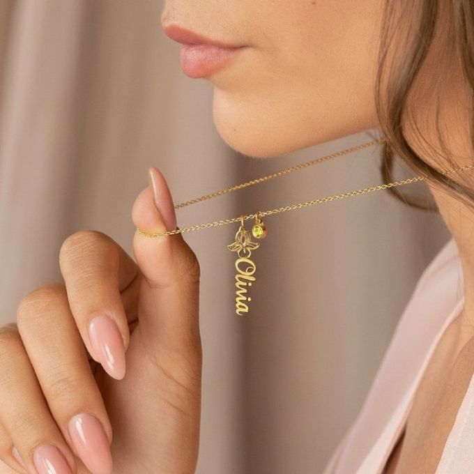 Olivia Blooming Birth Flower Name Necklace with Birthstone in 14K Solid Yellow Gold a woman wearing Olivia gold necklace with a name charm