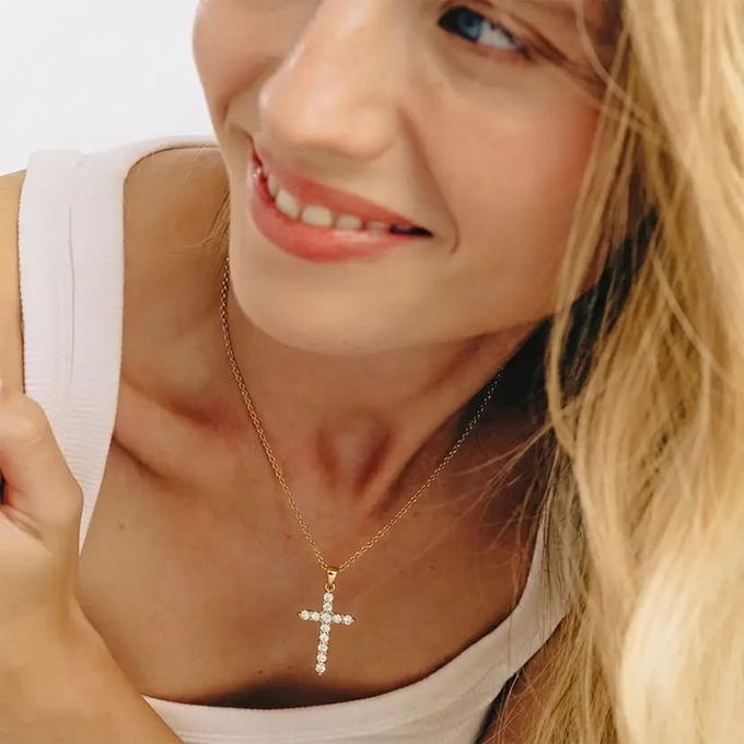 Cross CZ Pendant Necklace in Gold Vermeil a woman wearing a good luck cross necklace