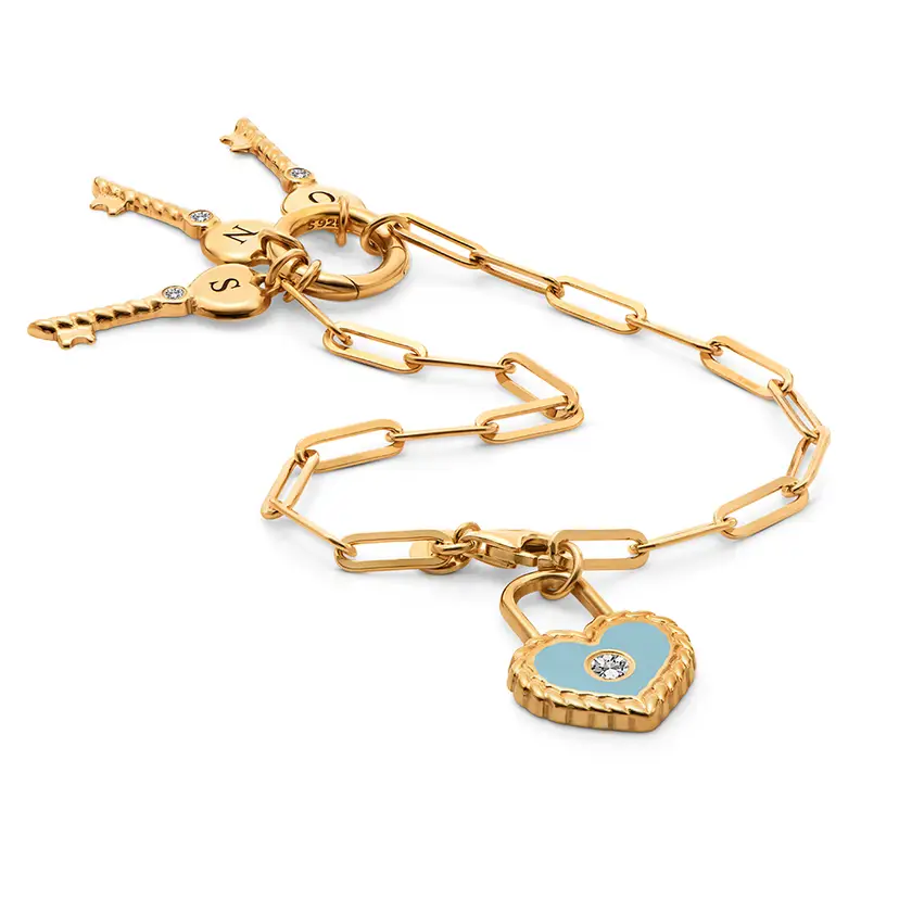 lock and key bracelet with blue lock charm a necklace with a heart shaped lock and a key