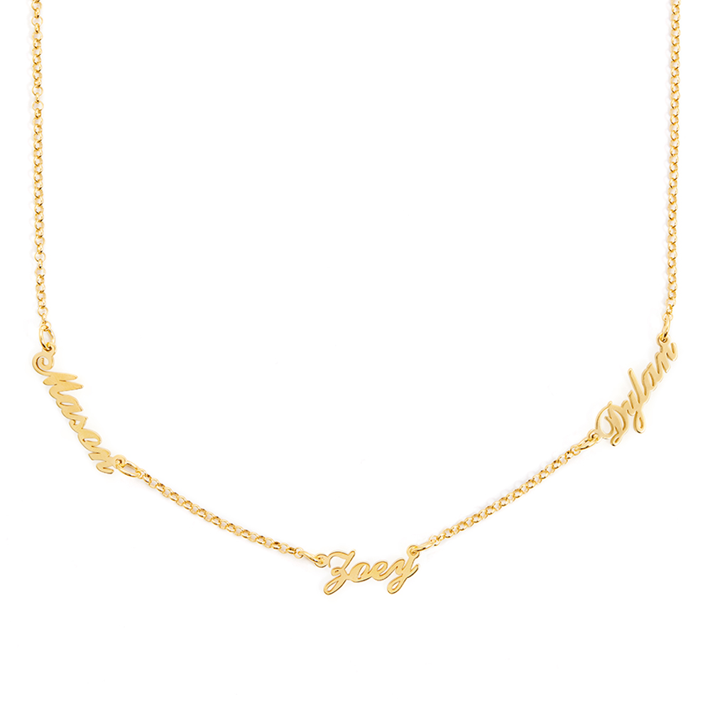 a gold necklace with names written on it