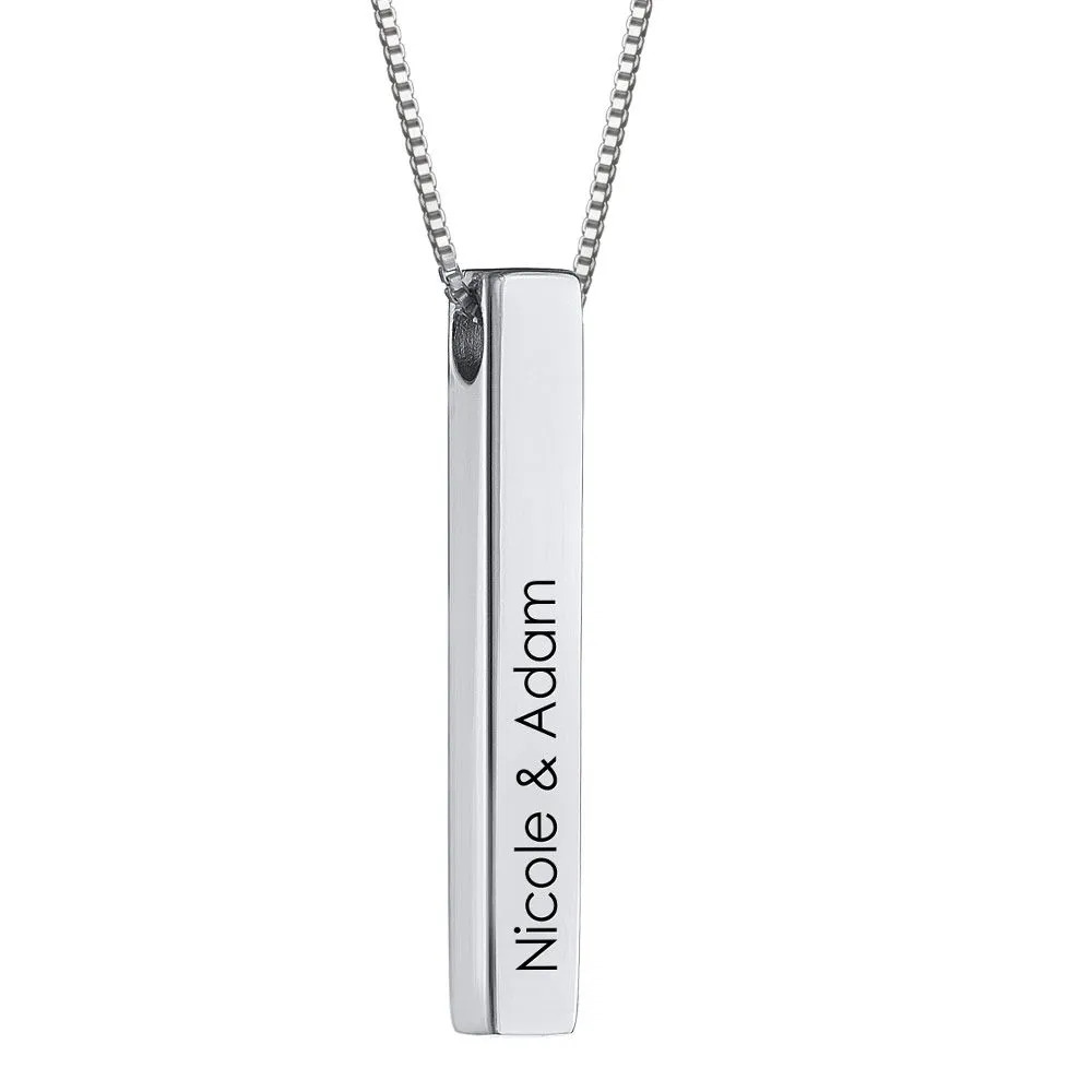 Stock image of a silver necklace with an inscribed vertical bar pendant