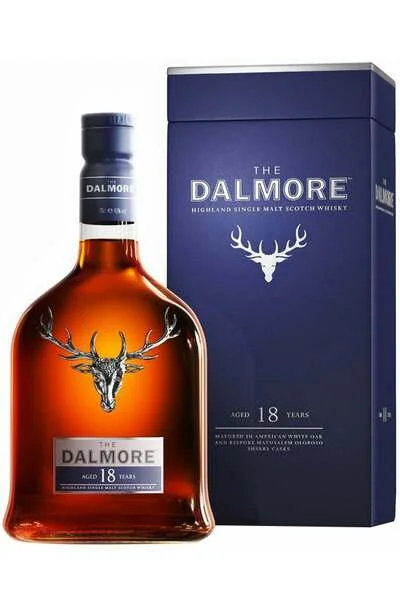 a bottle of Dalmore 18 Year Single Malt whisky next to a gift box by the same brand