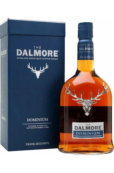 a bottle of Dalmore Dominium Single Malt whisky next to a dark blue gift box by the same brand