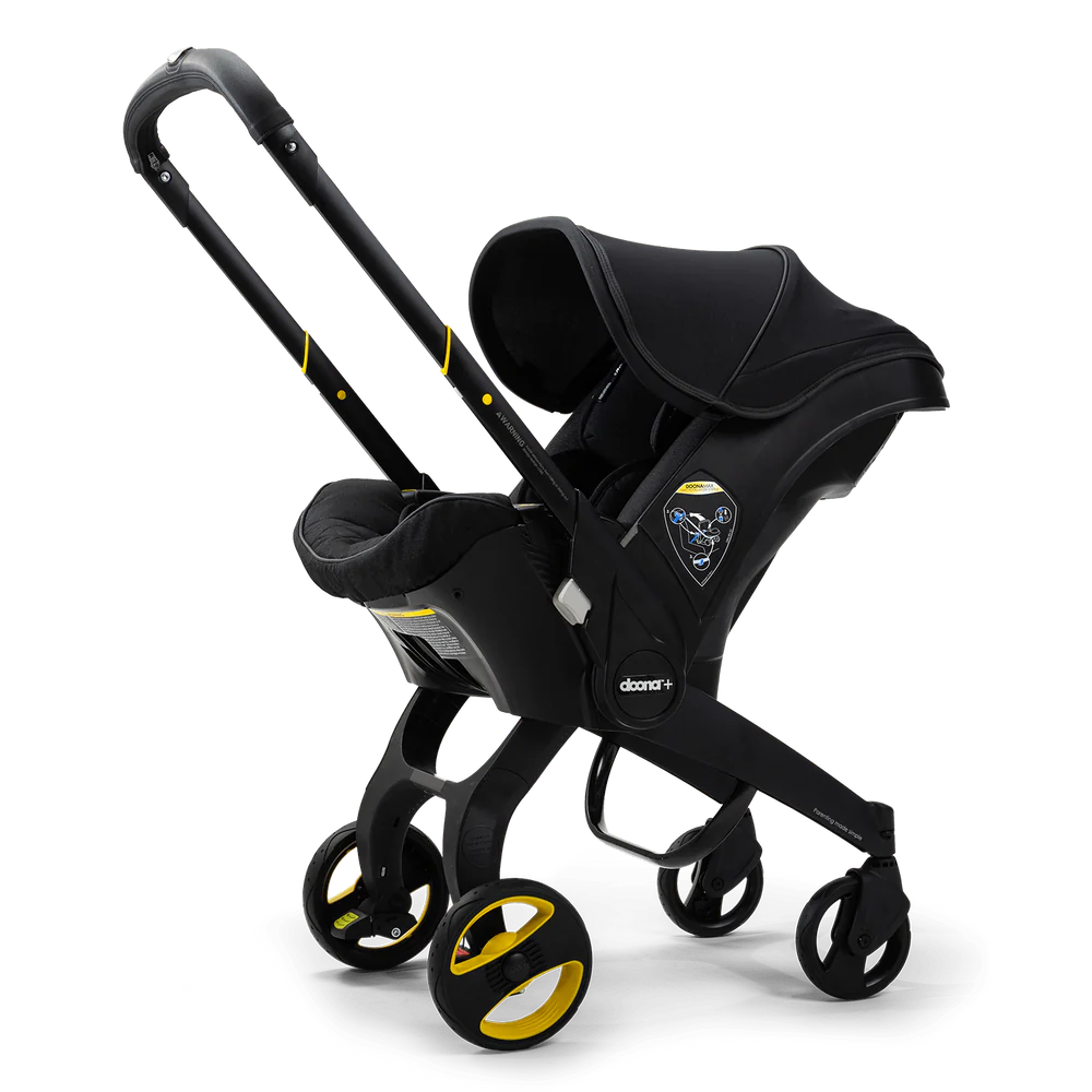 A black stroller with yellow wheels and a black seat