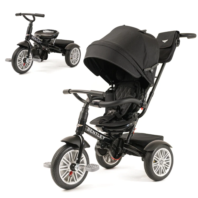 A black stroller with a black seat and a black trike beside it.
