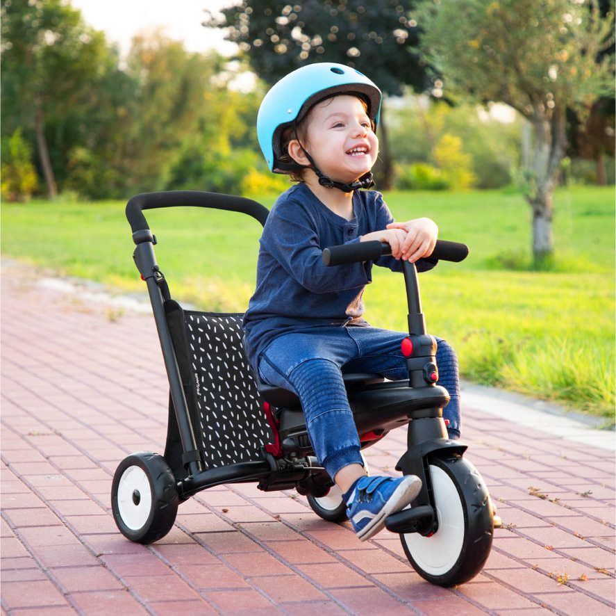 Child riding hotsell a bike