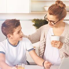 a woman and her son talking