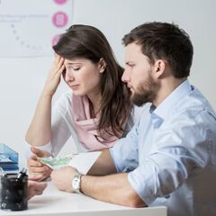 a man and a woman sitting at a table