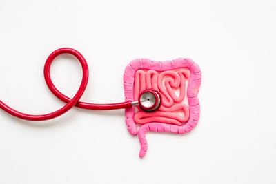 a stethoscope is attached to a pink piece of food