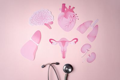a stethoscope and a stethoscope on a pink background