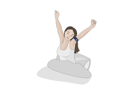 a woman sitting on a toilet with her arms in the air