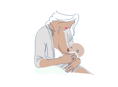 a woman holding a baby in her arms