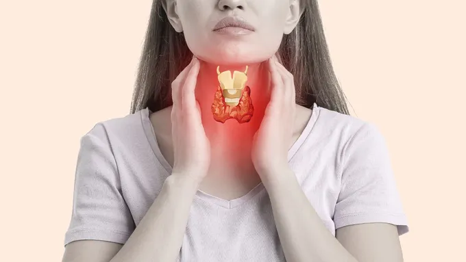 a woman holding her neck in pain