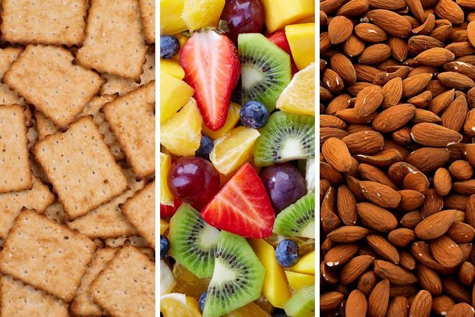 a variety of foods including crackers, nuts, and fruit