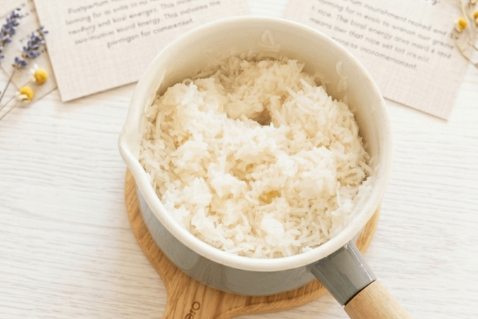 Postpartum Congee Postpartum Congee cooked in a pan