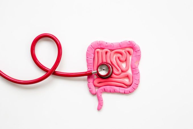 a stethoscope is attached to a pink piece of food