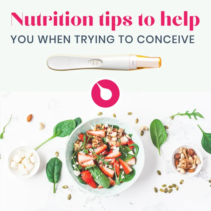 a bowl of strawberries, nuts, and spinach with a thermometer