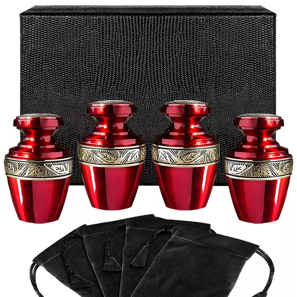 4 red keepsake urns wit gold detail on the body and lid 