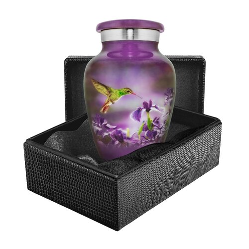 Nature's Peace Hummingbird Small Keepsake Urn for Human Ashes A stock image of a purple urn depicting a hummingbird in a black box