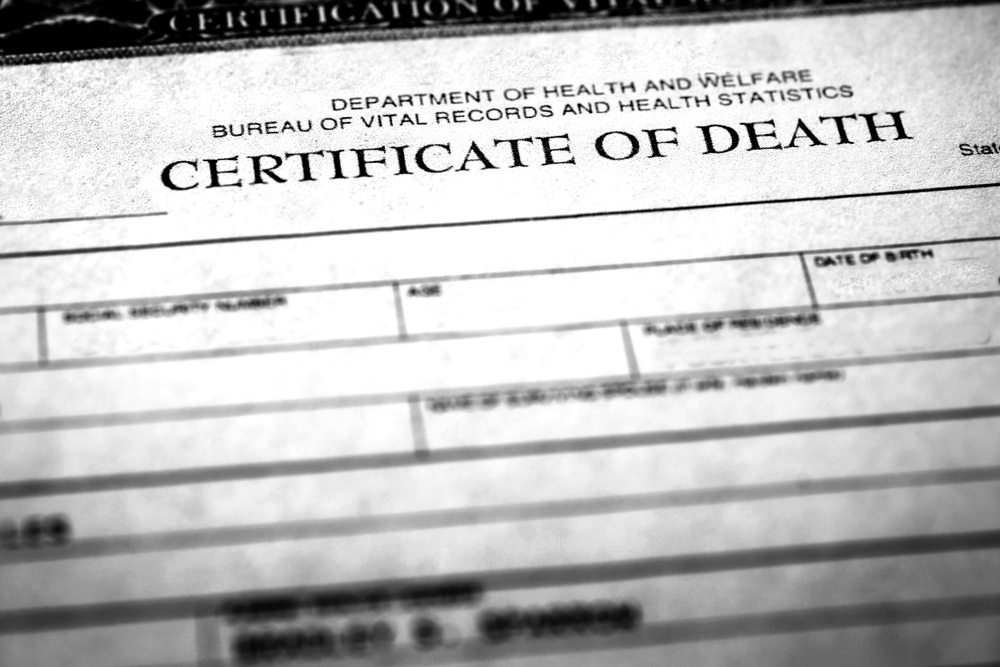 A certificate of death in black and white print