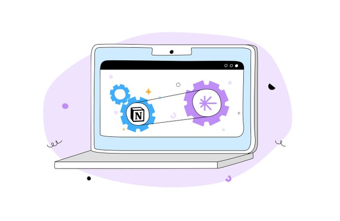 A graphic of a laptop with Unleash and Notion logos on the screen