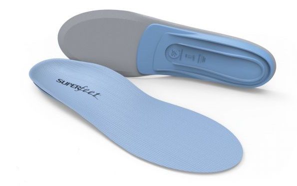 Front and back of blue insoles from Superfeet on display
