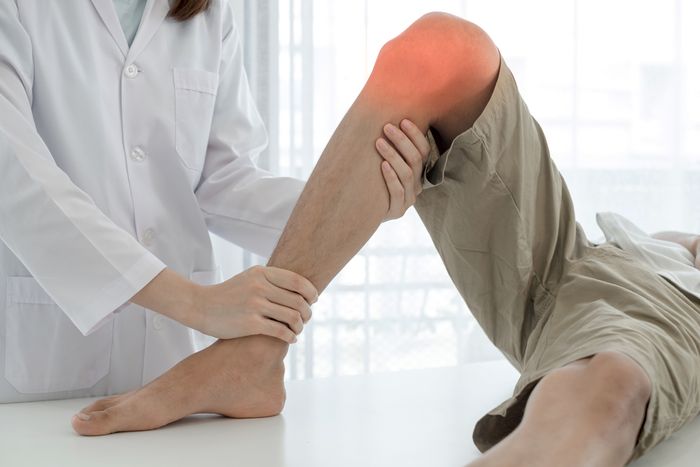 Man with sore knee