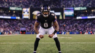 a football player stands on the field during a game