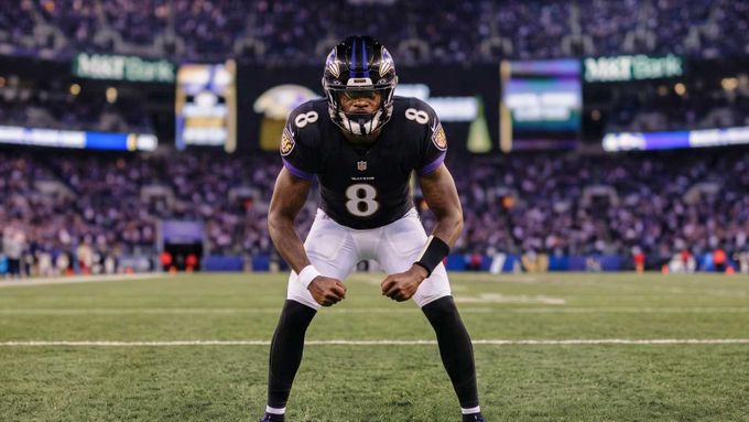 a football player stands on the field during a game